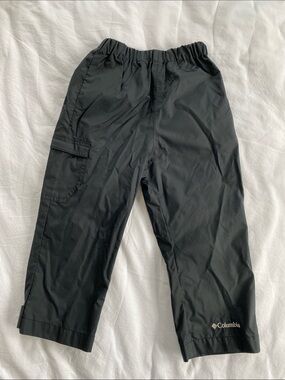 Columbia Black Kids Rain Pants with elastic waistband and adjustable leg cuffs